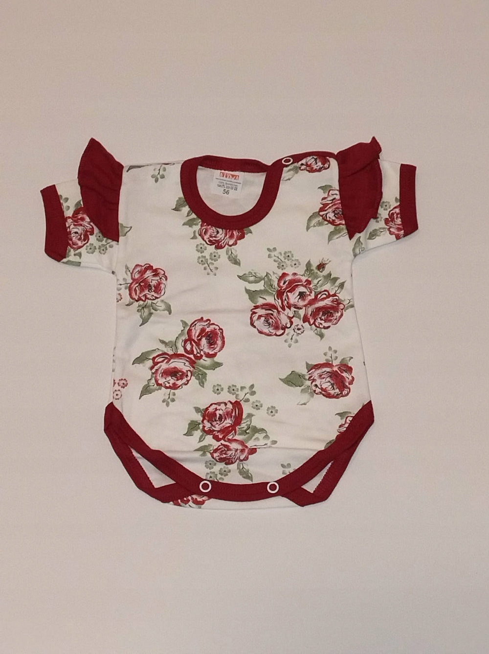 Komplet niemowlęcy 2cz body róże spodnie falbanka